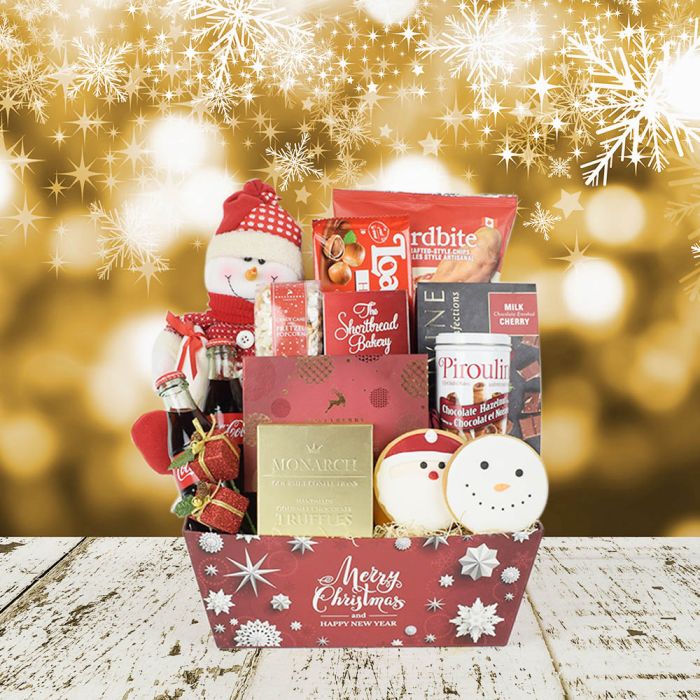 Santa’s Basket of Treats is a fabulous gift for dear ones and it includes a variety of treats for everyone in the family. Whether your loved ones prefer the sweeter side of desserts like chocolates and candy or more textured goodies like crunchy chips and popcorn, this set has got you covered